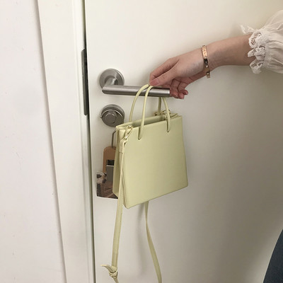 Γυναικεία τσάντα νέο μοντέλου από οικολογικό δέρμα με δύο λαβές σε διάφορα χρώματα