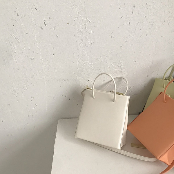 Γυναικεία τσάντα νέο μοντέλου από οικολογικό δέρμα με δύο λαβές σε διάφορα χρώματα 