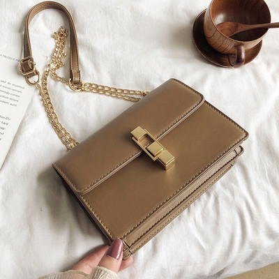 Geanta de dama cu inchidere metalica din imitatie de piele