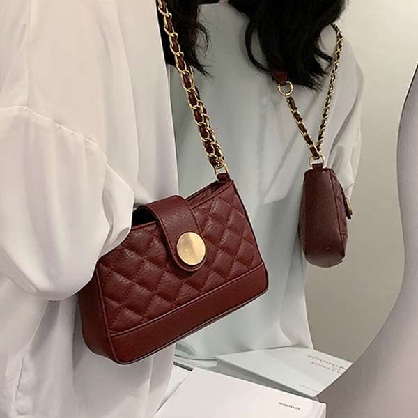 Γυναικεία έκο  δερμάτινη τσάντα με κουμπιά