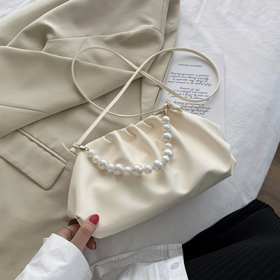 Κομψή γυναικεία έκο δερμάτινη τσάντα με πέρλες