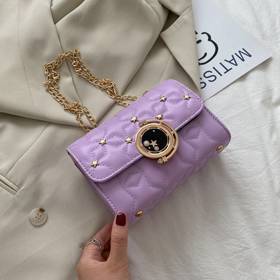 Geanta de dama din piele cu lant si elemente metalice