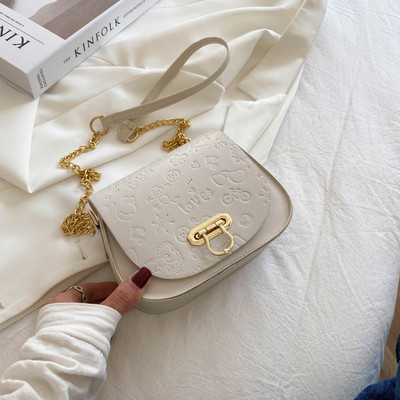 Geanta de dama din piele cu maner lung metalic