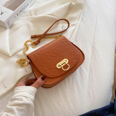 Geanta de dama din piele cu maner lung metalic