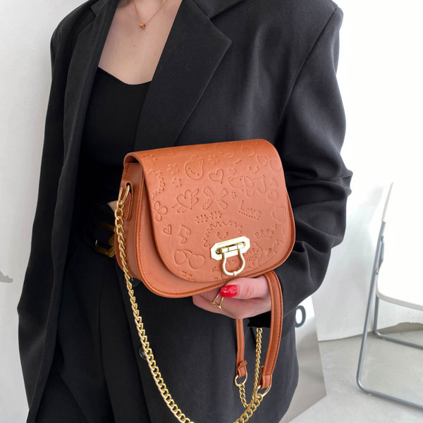 Geanta de dama din piele cu maner lung metalic