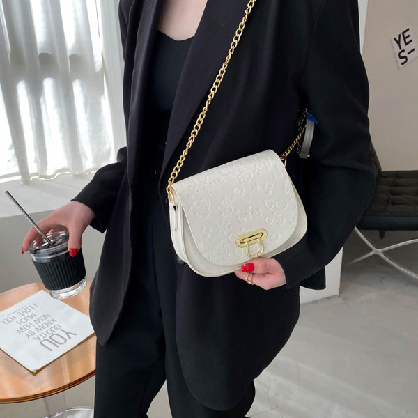 Geanta de dama din piele cu maner lung metalic