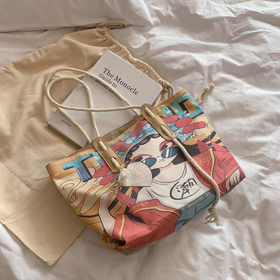 Γυναικεία υφασμάτινη τσάντα με εφαρμογές - με κοντή λαβή