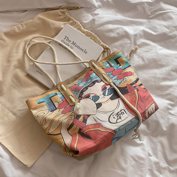 Γυναικεία υφασμάτινη τσάντα με εφαρμογές - με κοντή λαβή