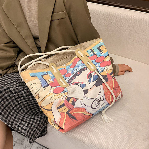 Γυναικεία υφασμάτινη τσάντα με εφαρμογές - με κοντή λαβή