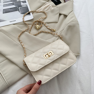 Γυναικεία τσάντα από έκο δέρμα και κούμπωμα