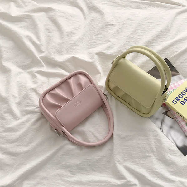 Μικρή γυναικεία έκο δερμάτινι τσάντα με κοντή  και μακρύ λαβή