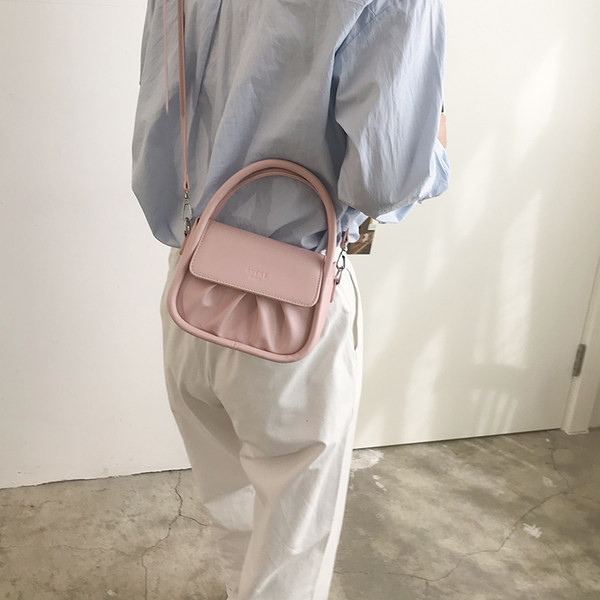 Μικρή γυναικεία έκο δερμάτινι τσάντα με κοντή  και μακρύ λαβή