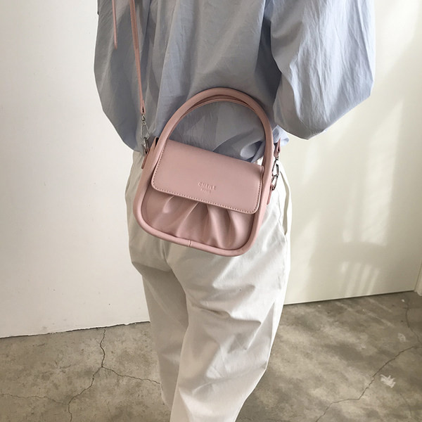 Μικρή γυναικεία έκο δερμάτινι τσάντα με κοντή  και μακρύ λαβή