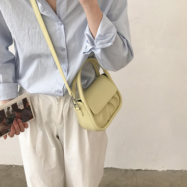 Μικρή γυναικεία έκο δερμάτινι τσάντα με κοντή  και μακρύ λαβή