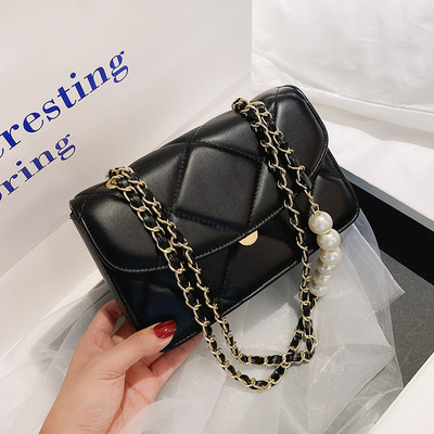 Γυναικεία τσάντα από οικολογικό δέρμα με μακριά λαβή και πέρλες