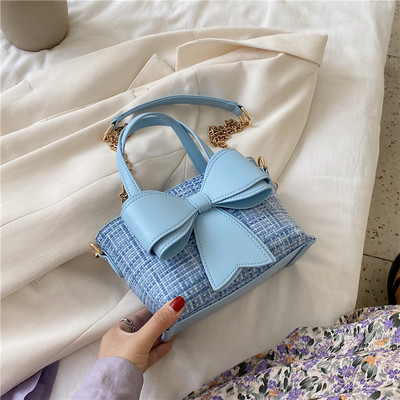 Σύγχρονη γυναικεία  τσάντα με κορδέλα και δύο λαβές