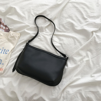 Casual γυναικεία τσάντα από οικολογικό δέρμα με ρυθμιζόμενη λαβή