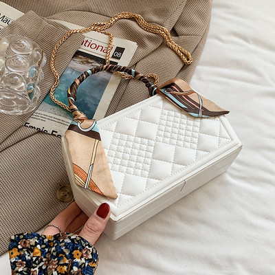 Sieviešu moderna soma ar reljefu ādas un tekstila rokturi