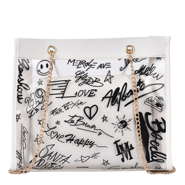 Moderna liela soma ar caurspīdīgu daļu un uzrakstiem