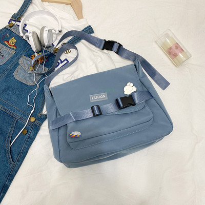 Γυναικεία υφασμάτινη τσάντα με ρυθμιζόμενη λαβή