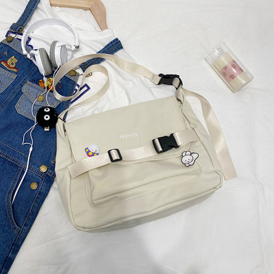 Γυναικεία υφασμάτινη τσάντα με ρυθμιζόμενη λαβή