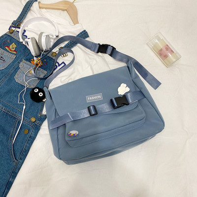 Γυναικεία υφασμάτινη τσάντα με ρυθμιζόμενη λαβή