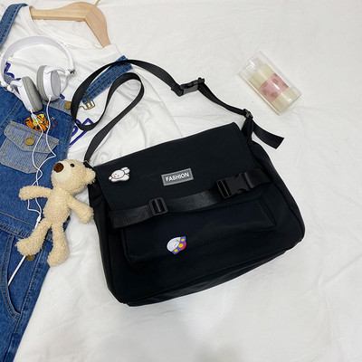 Γυναικεία υφασμάτινη τσάντα με ρυθμιζόμενη λαβή