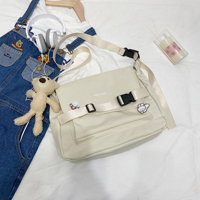 Γυναικεία υφασμάτινη τσάντα με ρυθμιζόμενη λαβή