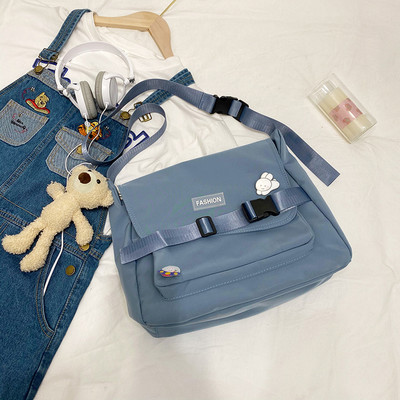 Γυναικεία υφασμάτινη τσάντα με ρυθμιζόμενη λαβή