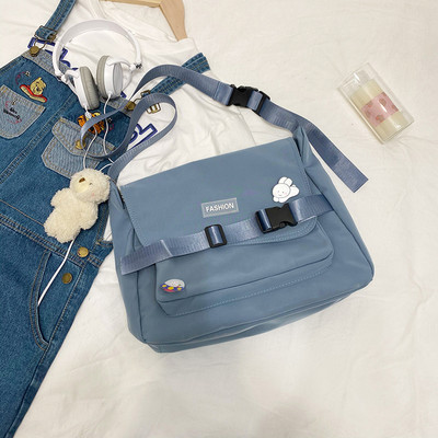 Γυναικεία υφασμάτινη τσάντα με ρυθμιζόμενη λαβή