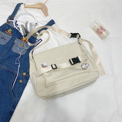 Γυναικεία υφασμάτινη τσάντα με ρυθμιζόμενη λαβή