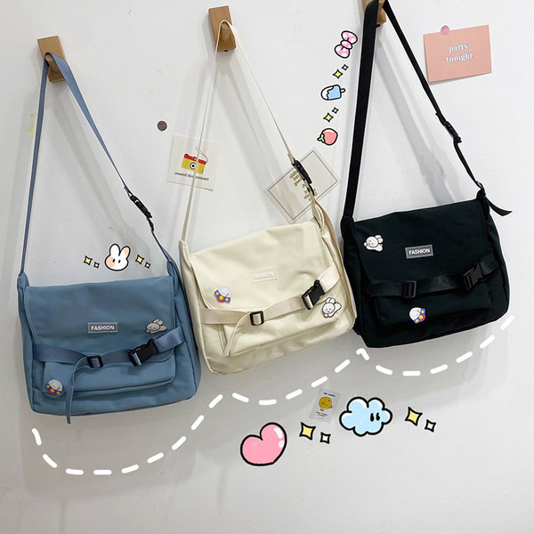 Γυναικεία υφασμάτινη τσάντα με ρυθμιζόμενη λαβή