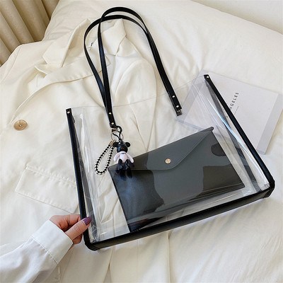 Γυναικεία διαφανής τσάντα με μενταγιόν ώμου