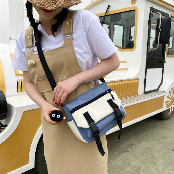 Γυναικεία υφασμάτινη τσάντα με ρυθμιζόμενο λουράκι