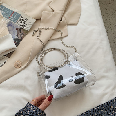 Caurspīdīga sieviešu soma ar metāla rokturiem