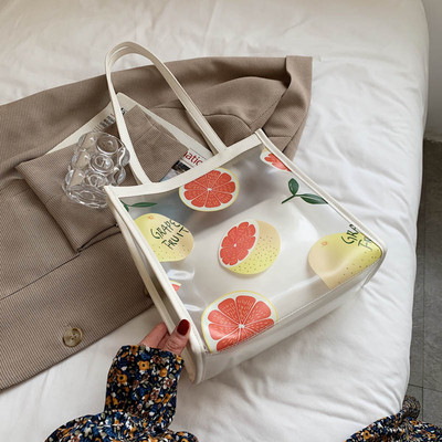 Modernus kasdieninis krepšys su permatoma dalimi ir spalvingomis aplikacijomis