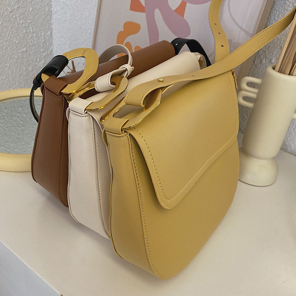 Casual γυναικεία τσάντα από δέρμα faux με ρυθμιζόμενη λαβή