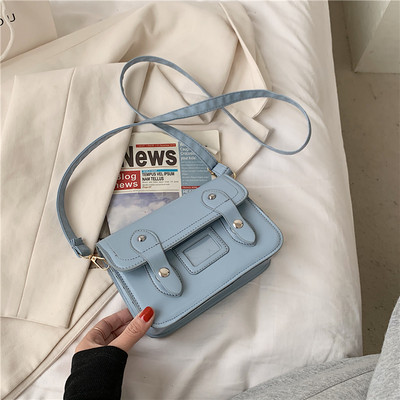 Geanta de dama din piele cu inchidere metalica si maner lung