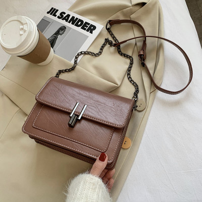 Geanta din piele cu maner lung si inchidere metalica