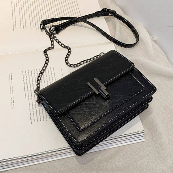 Geanta din piele cu maner lung si inchidere metalica