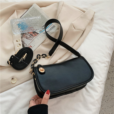 Απλή γυναικεία τσάντα από οικολογικό δέρμα με μακριά λαβή