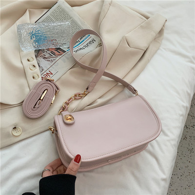 Απλή γυναικεία τσάντα από οικολογικό δέρμα με μακριά λαβή