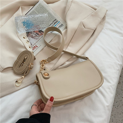 Απλή γυναικεία τσάντα από οικολογικό δέρμα με μακριά λαβή