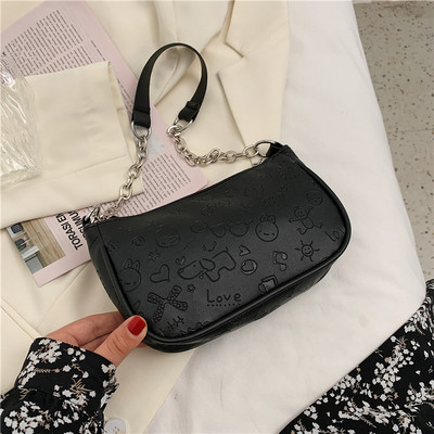 Σύγχρονη γυναικεία τσάντα με μεταλλική λαβή και φερμουάρ