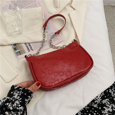 Σύγχρονη γυναικεία τσάντα με μεταλλική λαβή και φερμουάρ