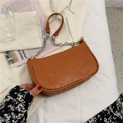 Σύγχρονη γυναικεία τσάντα με μεταλλική λαβή και φερμουάρ