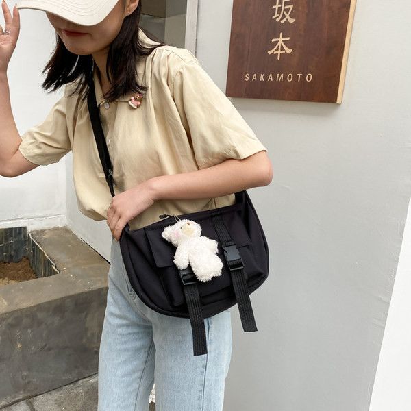 Γυναικεία υφασμάτινη τσάντα και κλείσιμο με φερμουάρ