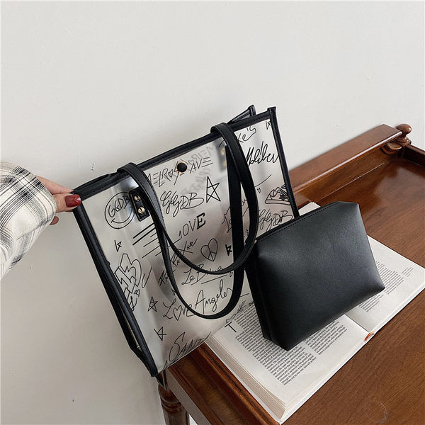 Γυναικεία διαφανής τσάντα με τρουξ