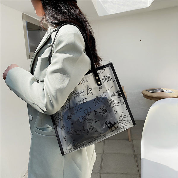 Γυναικεία διαφανής τσάντα με τρουξ