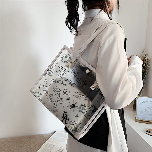 Γυναικεία διαφανής τσάντα με τρουξ